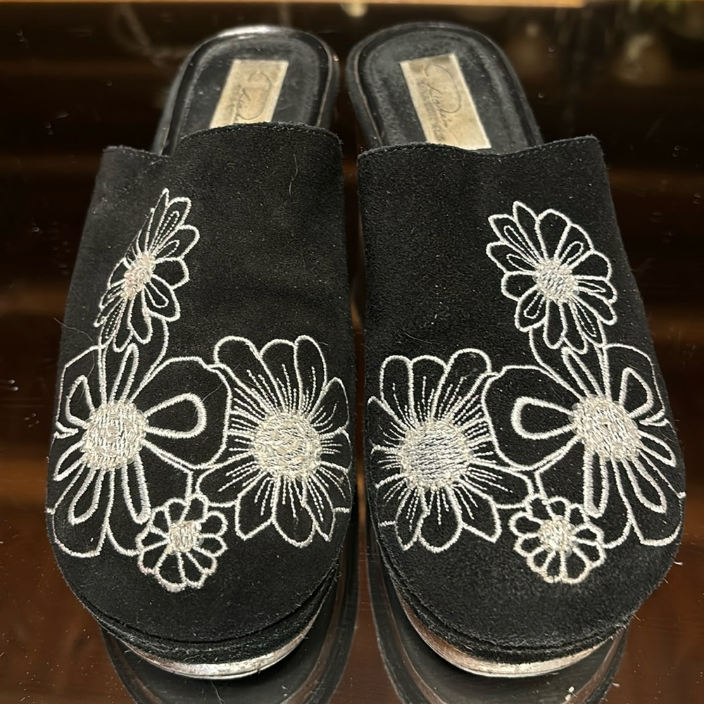 Black suede Diane’s Essentials clogs with white stitching